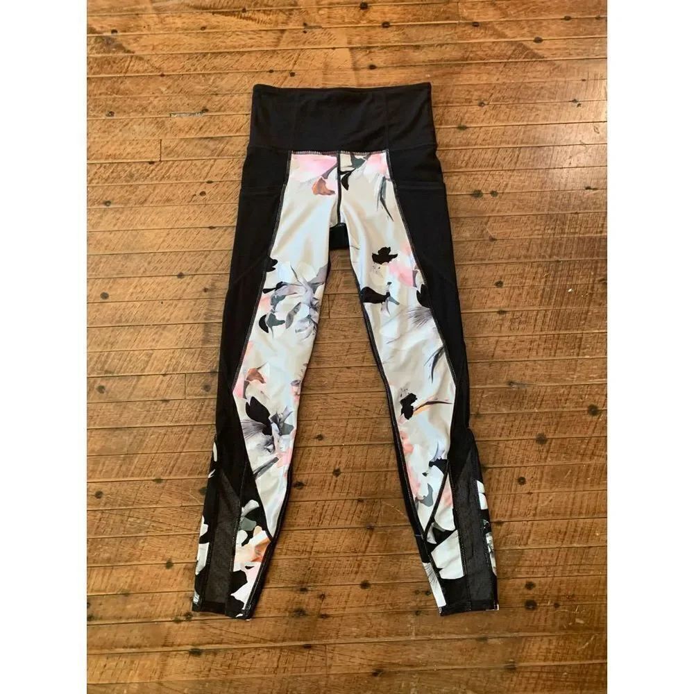 Athleta white floral and black panel XS mesh workout leggings
